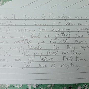 Photograph of a piece of paper with a written reflection on the Museum of Transology in Brighton 